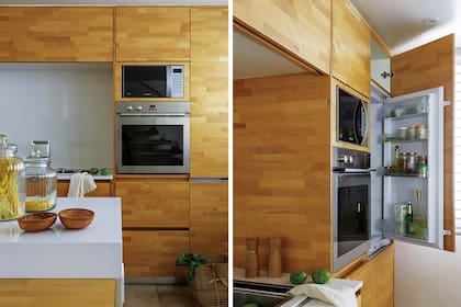 El frente de la heladera también se disimula con un panel de madera.