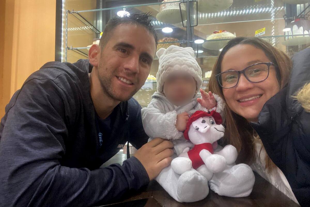 El gendarme argentino Nahuel Gallo junto a su pareja, la venezolana María Alexandra Gómez García, y su hijo, Víctor