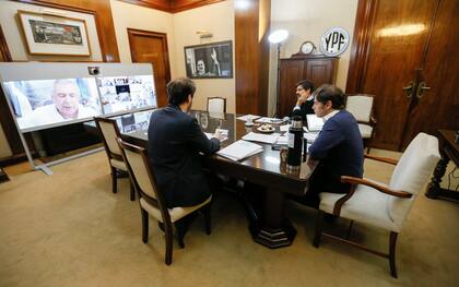 El gobernador con el ministro de Hacienda y el Jefe de Gabinete