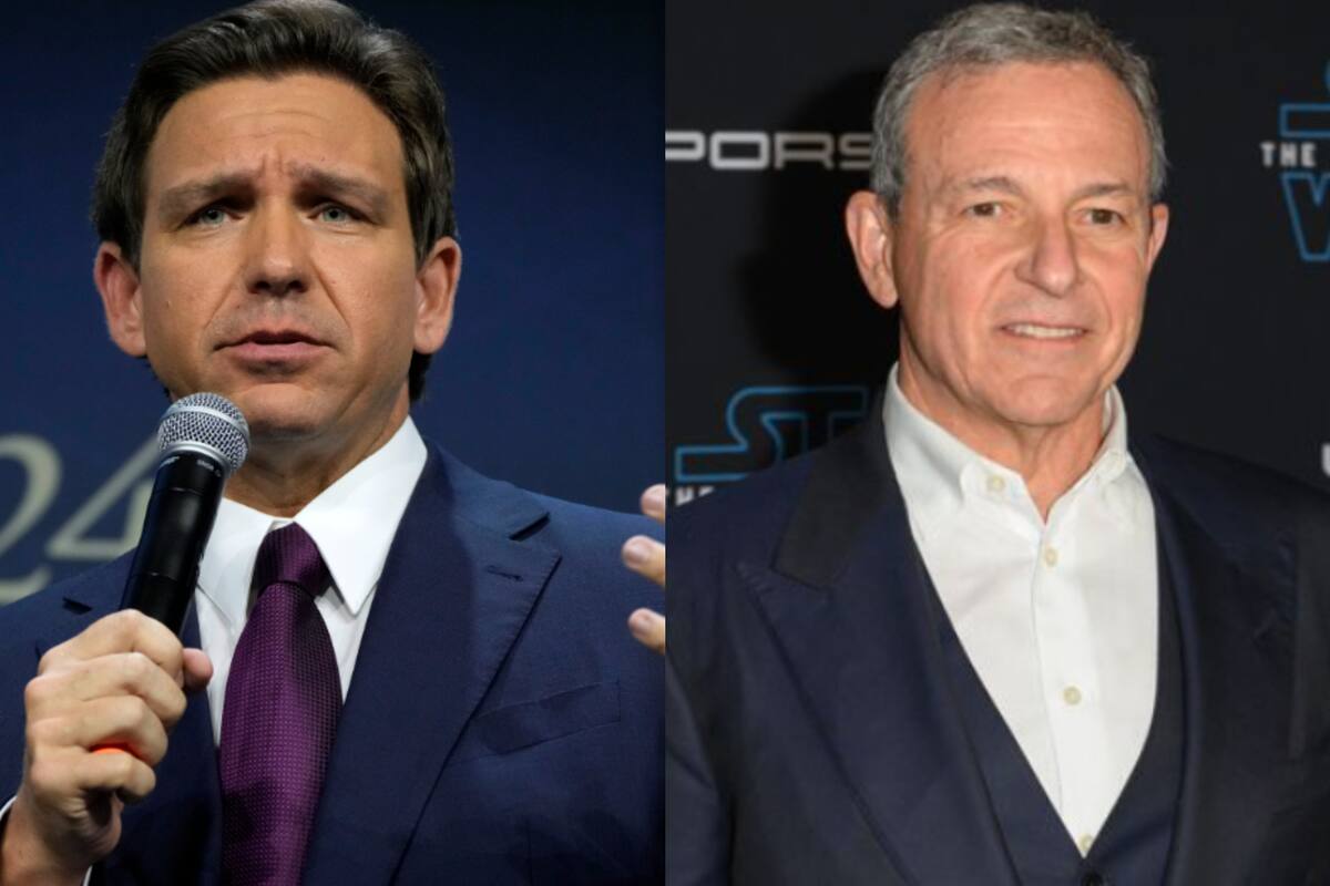 El gobernador de Florida, Ron DeSantis, (izquierda) y el CEO de Disney, Bob Iger