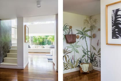 Subir por los escalones de madera pintada se convierte en una oportunidad cotidiana de disfrutar del jardín desde distintas alturas. Mural botánico de Florencia Chedufau, Percheros redondos (Broca Muebles).