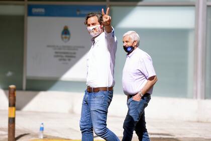 El jefe de gabinete Santiago Cafiero y Antonio Caló al arribar a la CGT