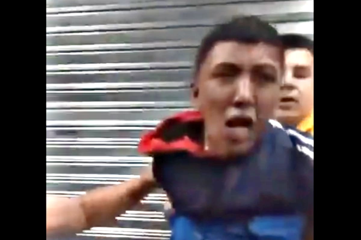 El ladrón tras ser reducido por los vecinos de La Plata.