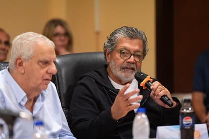 El líder sindical Omar Lingieri junto a Gerardo Martínez de la Uocra