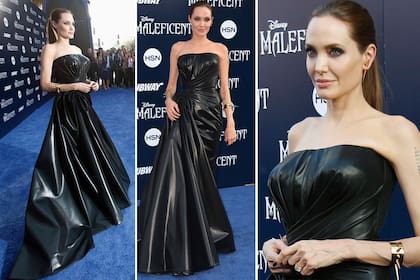 El look de Angelina Jolie, en detalle: vestido de cuero negro, accesorios punk, y por supuesto, el anillo de compromiso con Brad Pitt