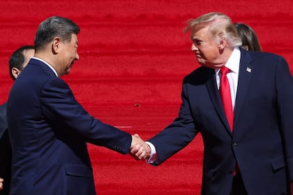 El mandatario chino Xi Jinping, junto a Donald Trump en Pekín