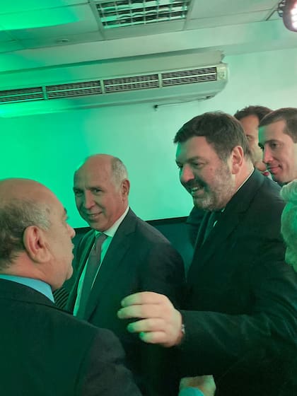 El ministro de la Corte Suprema Ricardo Lorenzetti junto al juez federal Ariel Lijo en una visita a la ciudad de Rosario