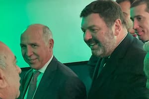 El ministro de la Corte Suprema Ricardo Lorenzetti junto al juez federal Ariel Lijo en una visita a la ciudad de Rosario