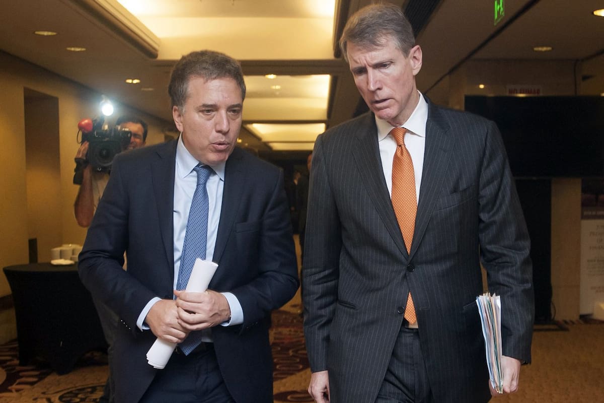 El ministro Dujovne y el presidente del IIF, Tim Adams, al llegar ayer al encuentro del Instituto de Finanzas global