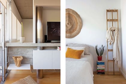 En el dormitorio sin mesa de luz, los libros apilados sirven como apoyo para una planta.