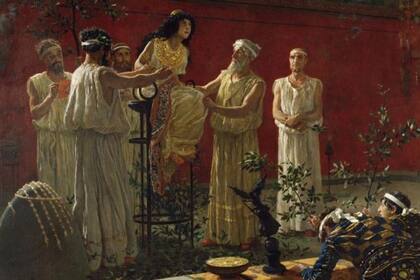 "El Oráculo", pintado por Camillo Miola en 1880, con la Pitia sentada sobre un trípode rodeada de sacerdotes u oficiantes, en el oráculo de Delfos