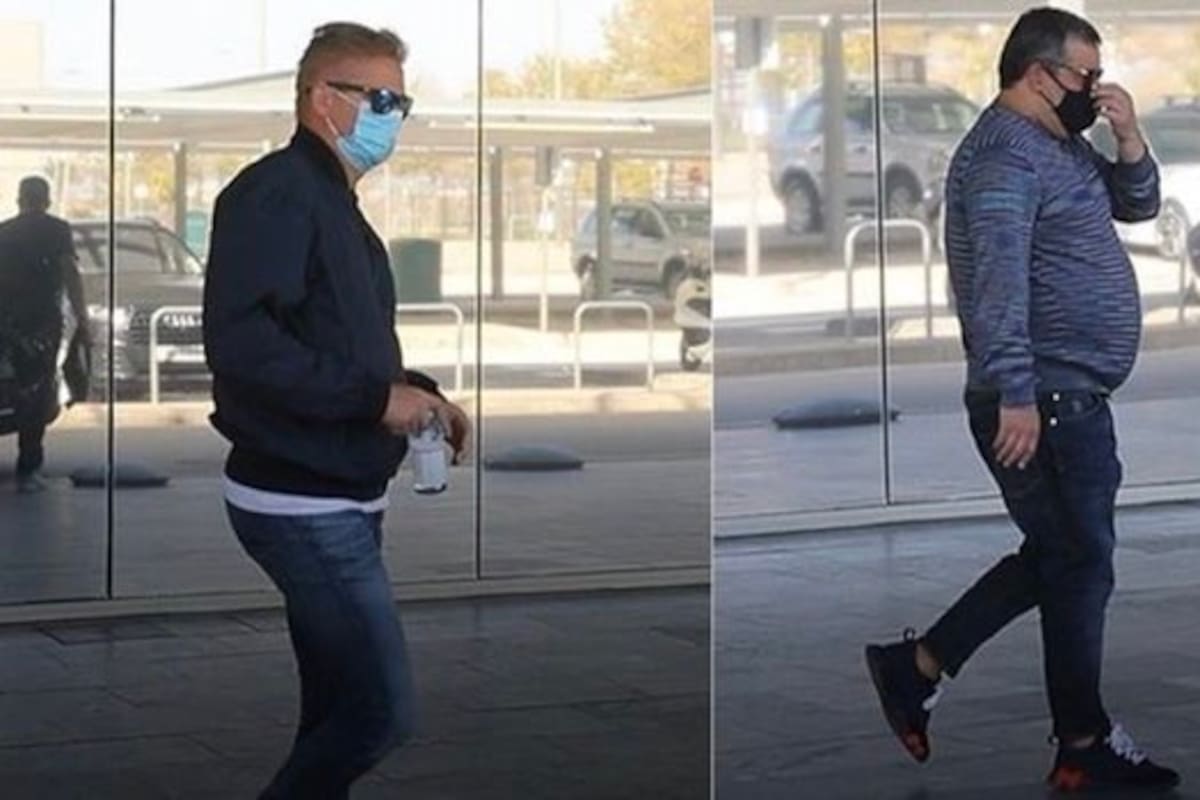 El padre de Haaland y el representante de jugadores Mino Raiola, fotografiados en el aeropuerto de El Prat, en Barcelona