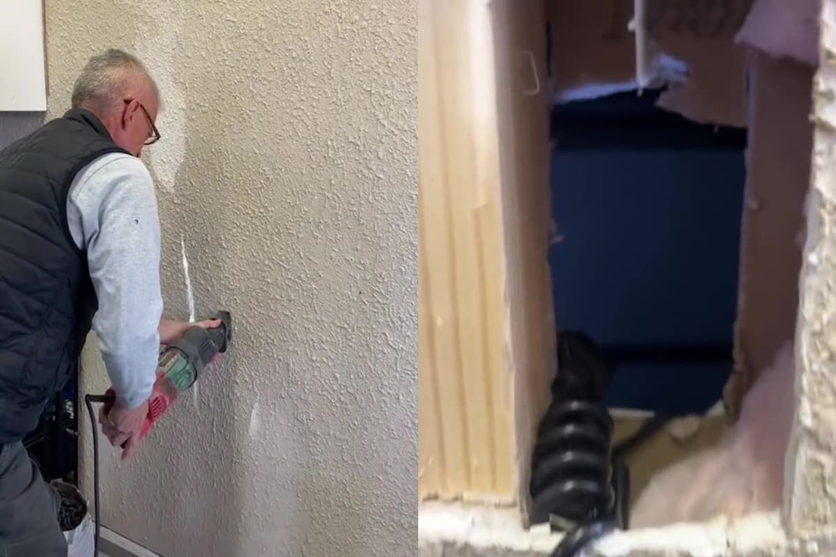 El padre de la usuaria haciendo el hueco en la pared del cuarto oculto