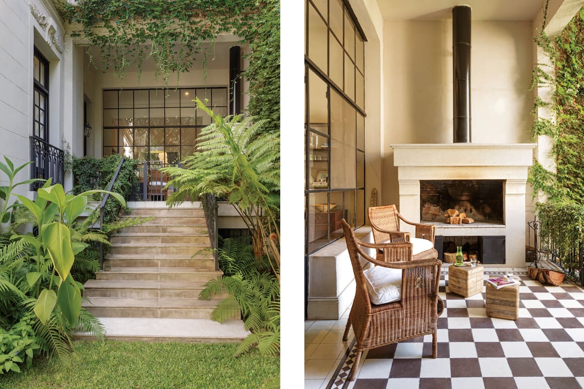 El patio con piso damero y chimenea –que es parrilla y hogar en invierno– es el nexo entre la cocina y la fronda.