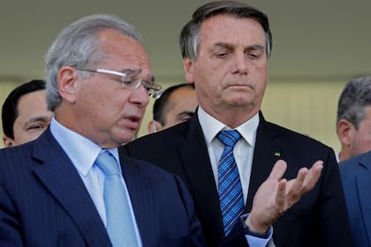 Bolsonaro junto a su ministro de Economía, Paulo Guedes