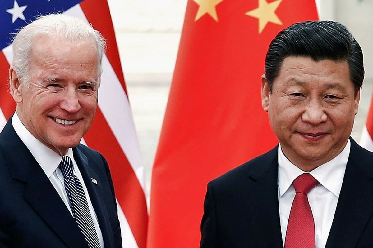 El presidente chino, Xi Jinping, recibe en Pekín a Joe Biden, entonces vicepresidente, en diciembre de 2013.