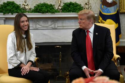 El presidente de Estados Unidos junto a Fabiana Rosales