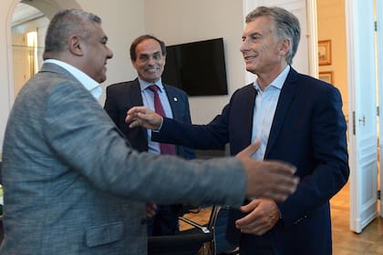 El presidente Mauricio Macri y Claudio Tapia