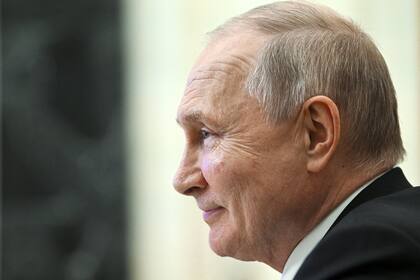 El presidente ruso, Vladimir Putin, en una reunión por videoconferencia en el Kremlin, en Moscú. (Alexander Kazakov, Sputnik, Kremlin Pool via AP)