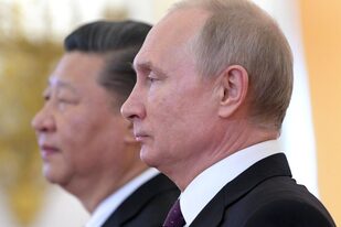 El presidente ruso Vladimir Putin junto a su par chino Xi Jinping.