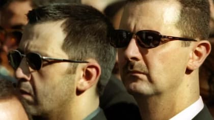 El presidente sirio y su hermano menor, Maher al-Assad