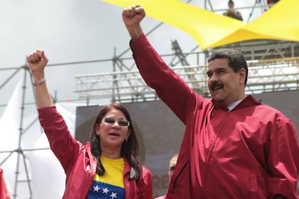 El presidente venezolano y su mujer, que se hace llamar "la primer combatiente"; se conocieron en 1999