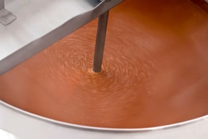 El dulce de leche es uno de los insumos principales de los alfajores