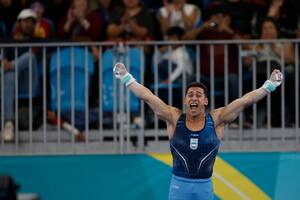 El rugido de Daniel Villafañe después de completar su rutina en anillas