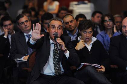 El secretario de Comercio Interior, Guillermo Moreno, y el viceministro de Economía, Axel Kicillof, participan de la asamblea de accionistas del Grupo Clarín, en representación de la participación que tiene el Estado en la empresa. Télam Buenos Aires 25/04/2013