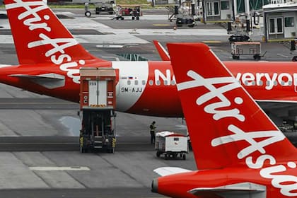 El vuelo QZ8501 de AirAsia tenía 162 personas a bordo, incluidos siete tripulantes
