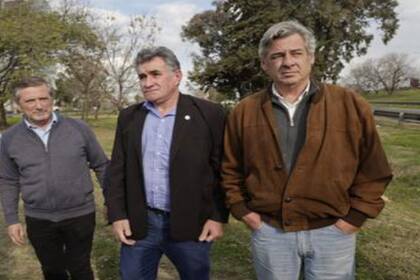 Elbio Laucirica (Coninagro), Carlos Achetoni (Federación Agraria Argentina) y Nicolás Pino (SRA)