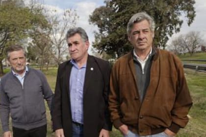 Elbio Laucirica (Coninagro), Carlos Achetoni (Federación Agraria Argentina) y Nicolás Pino (SRA)