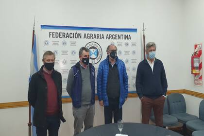 Elbio Laucirica (Coninagro), Carlos Achetoni (FAA), Jorge Chemes (CRA) y Nicolás Pino (SRA)