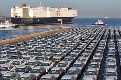 Electric cars for export waiting to be loaded on a cargo ship at a port in eastern China in January. BYD