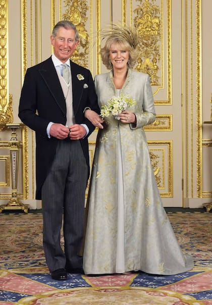 (EMBARGOED TILL 0001 BST MONDAY 11 APRIL 2005) WINDSOR, ENGLAND - APRIL 9: TRH Prince Charles, The Prince of Wales and The Duchess Of Cornwall, Camilla Parker-Bowles pose in the White Drawing Room at Windsor Castle for the Official Wedding photograph following their marriage on April 9, 2005 in Windsor, England. (Photo by Hugo Burnand/Pool/Tim Graham Picture Library/Getty Images)