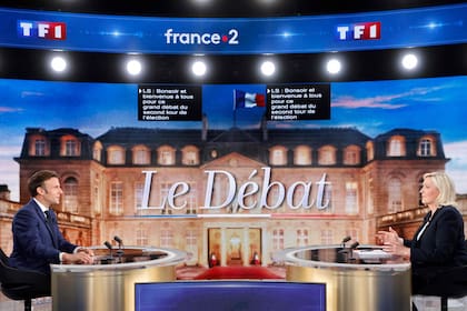 Emmanuel Macron y Marine Le Pen, en el debate en Francia. Photo: Ludovic Marin/AFP