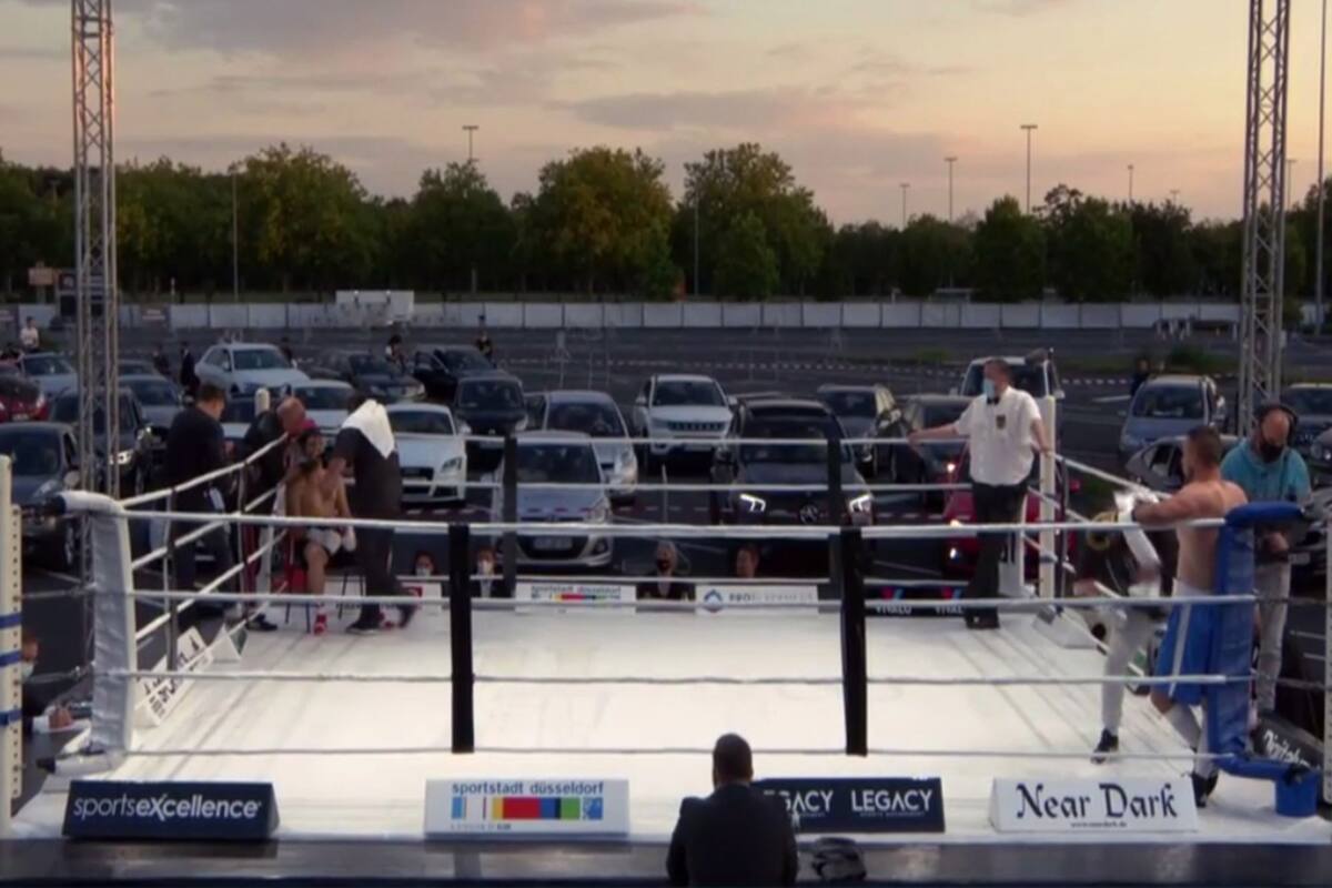 En Alemania, el regreso del boxeo fue en un estacionamiento, con dos personas por vehículo
