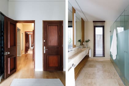 En baño, marmetas de Travertino pulido (De Stefano). Mesada, también de Travertino (San Jorge Sur). Griferías (FV). Amoblamiento (Celina Espósito). Detrás de los paneles de madera se esconden botiquines.