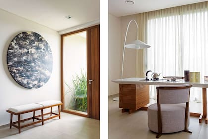 En el hall, obra circular (Praxis) y banqueta de lenga con lustre mate (Atelier MOP) tapizada en telar de algodón (De Levie). Der.: Lámpara de pie ‘Bienvenida’ (Federico Churba) con pantalla cónica al estilo sombrero chino.