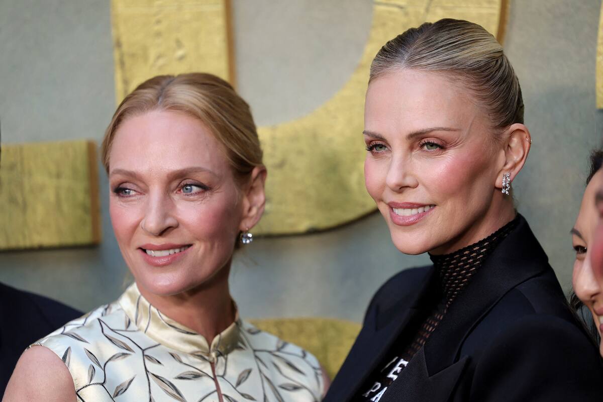 En fotos: del osado outfit de Charlize Theron que despertó los aplausos de Uma Thurman a la visita real de George Clooney