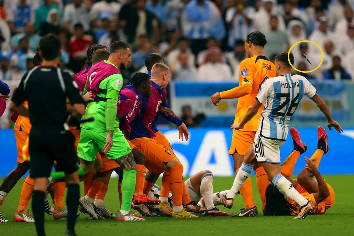 En la imagen circular se puede apreciar lo que le tiraron a Nahuel Molina durante el áspero cruce entre argentinos y neerlandeses