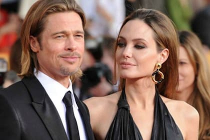 En su disputa por el divorcio, Brad Pitt se habría dado por vencido en una batalla legal contra Angelina Jolie (Foto: AFP)