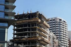 Las razones por las que en la Argentina los que construyen proyectos inmobiliarios cumplen el rol de los bancos