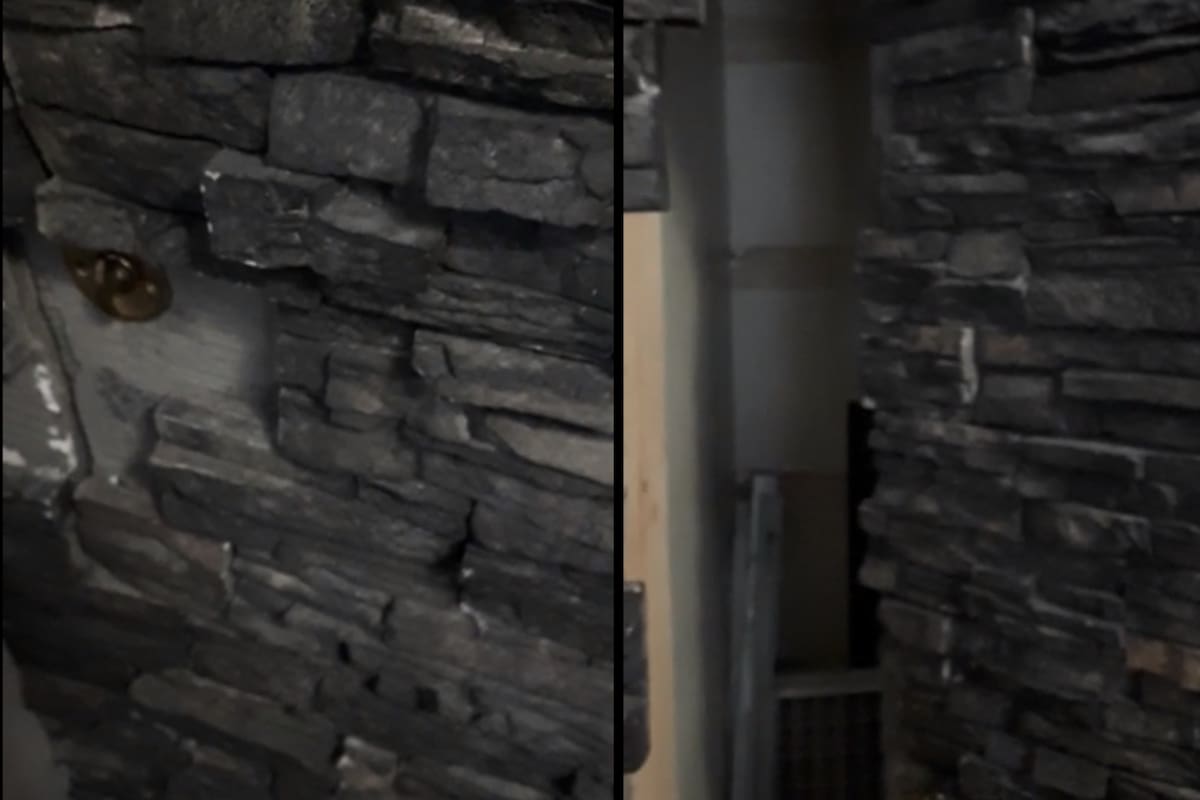 Encontró una puerta secreta en un llamativo muro de piedras ubicado en el comedor de su casa y lo mostró en un video que se hizo viral (Reddit)