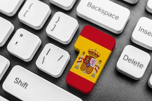 Enter key button with Flag of Spain. Close-up.