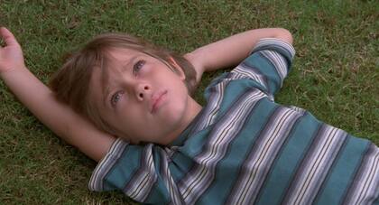 Escenas de cuatro de los títulos más destacados del cine del siglo XXI: Petróleo sangriento (1), El viaje de Chihiro (2), Intensa-mente (3) y Boyhood, momentos de una vida (4)