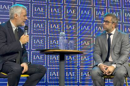 Federico Furiase, director del BCRA, junto a Lucas Pussetto, profesor del IAE Business School