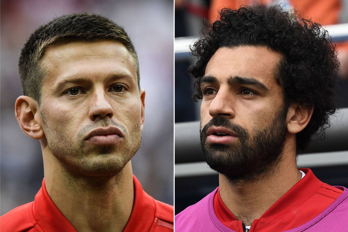 Fedor Smolov de Rusia y Mo Salah de Egipto
