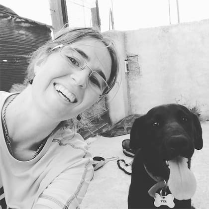 Fer, de cachorro y con su chapita identificatoria.