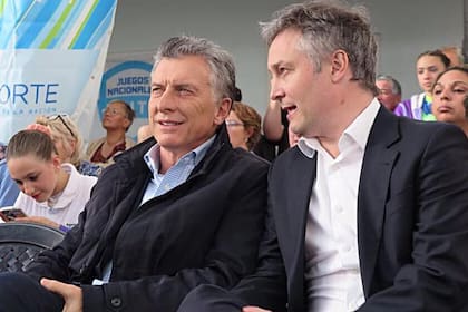 El exsecretario general Fernando de Andreis junto al expresidente Mauricio Macri.